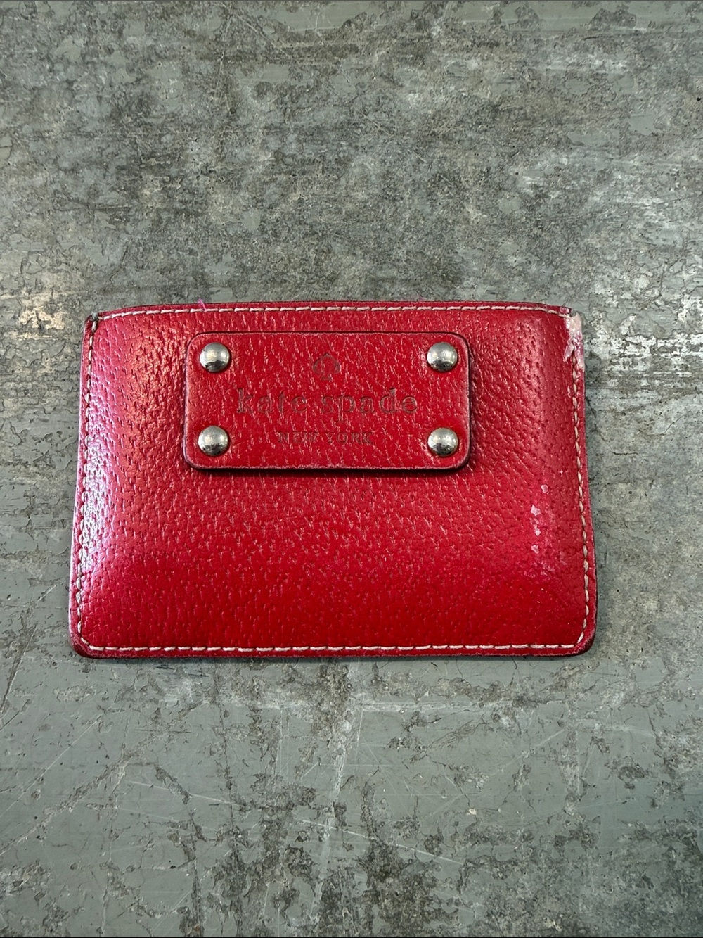 kate spade red and tan card sleeve